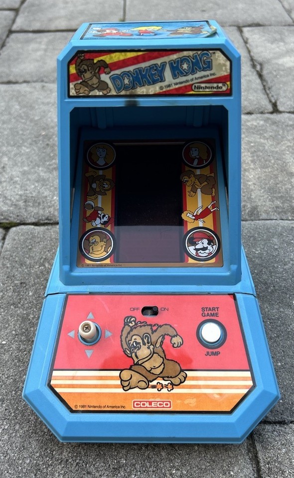 An original 1982 Donkey Kong Coleco tabletop mini arcade — a physical piece of gaming history that looks incredible on a desk even if it needs some TLC.