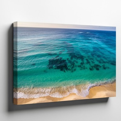 Wall Art Aerial View Reveals A Serene Beach Scene Where The Ocean  Canvas Print