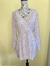 Boohoo size 10 white floral dress with open back detail and tie.
