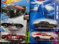 HOT WHEELS MUSCLE CARS ASSORTED LOT OF 4 CARS MINT CARDS