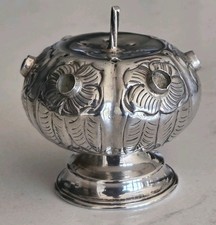 Vintage Sterling Silver pumpkin-shaped salt or pepper shaker.
