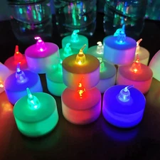 LANKER 24 Pack LED Tea Lights Candles, 7 Color Changing Flameless Tealights, ...