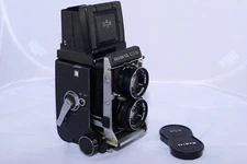 Mamiya C330 Pro F with Mamiya 80/2.8 lens. Waist Level Finder. Front Lens Cap.
