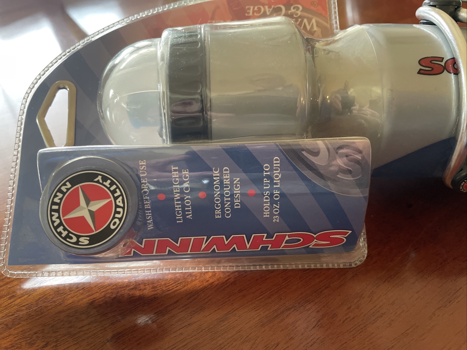 Schwinn Bike Water Bottle with Bottle Holder, BPA Free Squeeze Sport