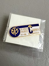 Pinback solapa del Colegio de Quiropráctica de Los Ángeles 75 aniversario 1911-1986