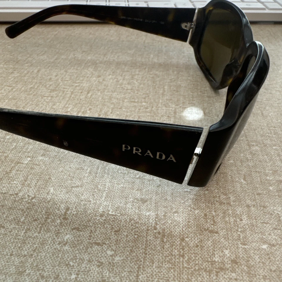 Monturas de gafas de sol Prada para piezas lentes no incluidas SPR 12H para mujer Foto 2 de 4