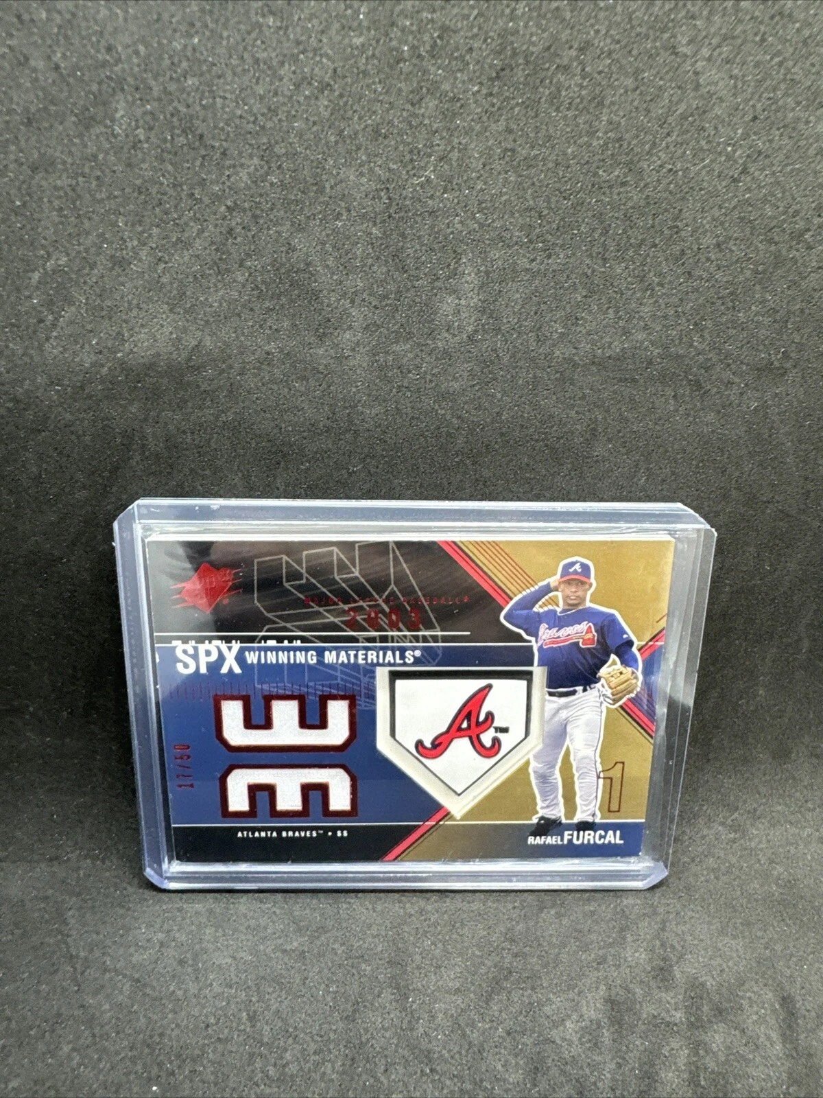 - 2003 SPx Winning Materials #RF2A Rafael Furcal Logo Jersey/175 Braves
