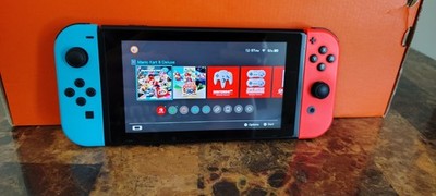 Nintendo Switch 32GB Gray Console with Neon Red and Neon Blue Joy-Con