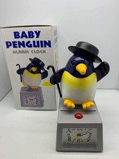 Reloj despertador de cuarzo vintage Baby Penguin con sonido y movimiento Taiwán RARO SIN USAR