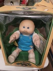 Cabbagepatch Kids No Hair Still In The Box with Adoption Papers. Excellent Cond