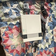 Nintendo Entertainment System Console with Controllers, Zapper, and Games