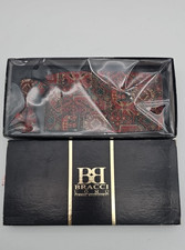 New Bracci Uomo formal set. Red geometric rug print bow tie and pocket square.