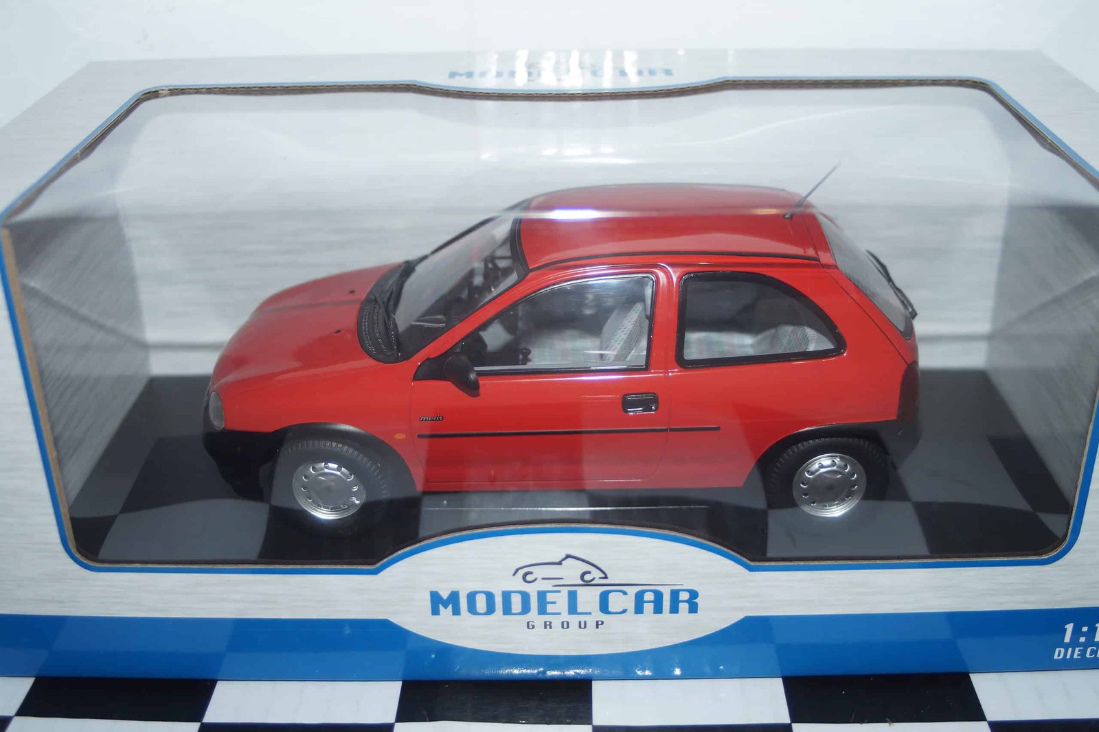 Model Car Group Vauxhall / Opel Corsa Merit in Red RHD MCG18845 1:18th