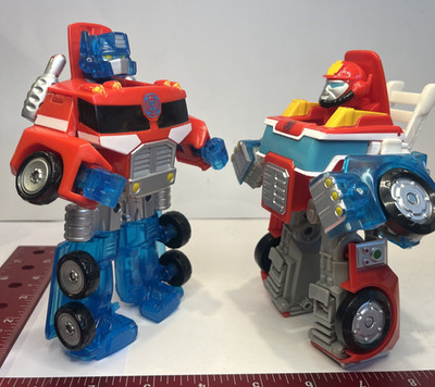 Playskool Heroes Transformers Rescue Bots Optimus Prime and Heatwave Fire-Bot!