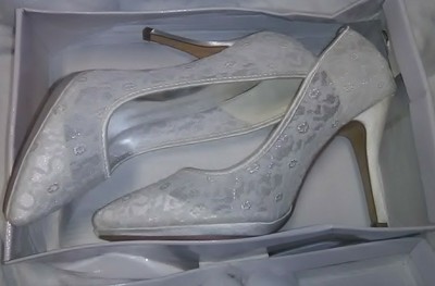 white pumps with flowers