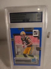 2022 Donruss CHRISTIAN WATSON Rated Rookie BLUE PRESS PROOF #319 Packers. MINT 9