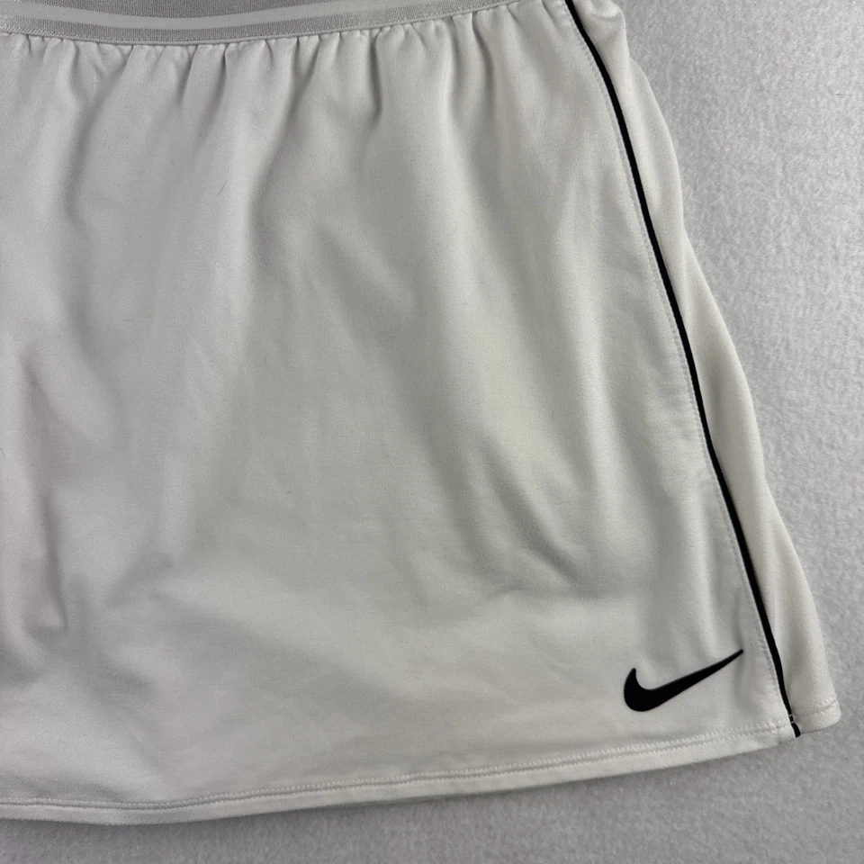 Pantalón corto de tenis Nike Dri Fit blanco negro talla grande juvenil Foto 2 de 4