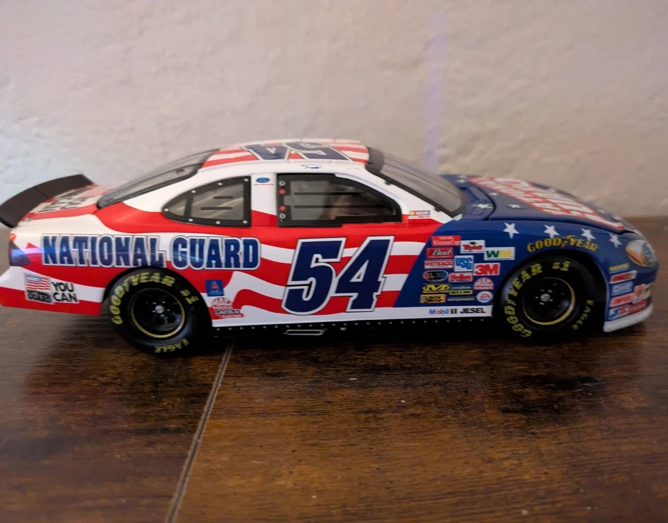Todd Bodine #54 Guardia Nacional 2003 Taurus 1:24 Nascar Action Diecast Model Foto 3 de 4