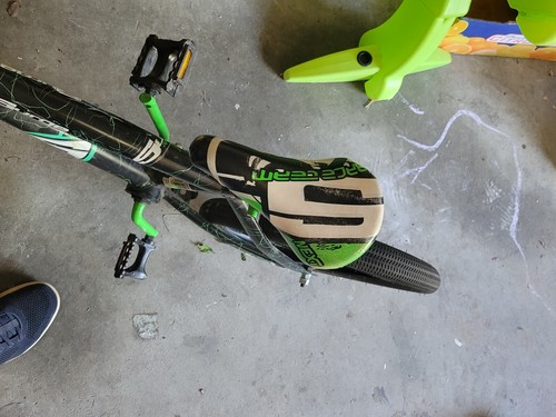 Next race bycicle 3-4inch cut on seat and the back rubber wheel part is off!