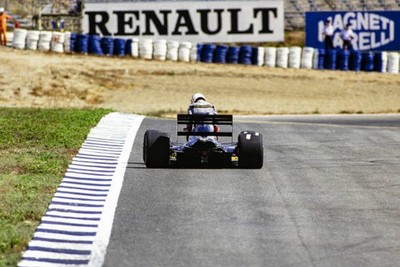 Gabriele Tarquini exits his broken down AGS JH25 Ford Spanish GP a- Old Photo