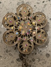 Bedazzled Flower Silver Tone badge holder with AB crystals mini flowers