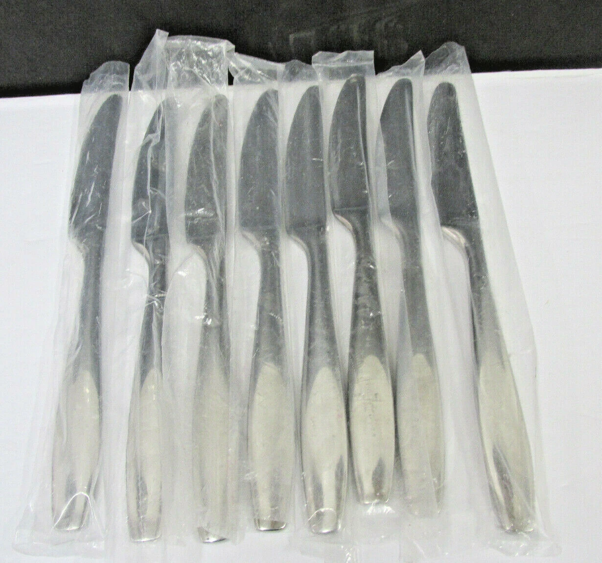 SKANDIA - ALLISON STAINLESS BY GINKGO 8 7/8" GLOSSY SERRATED DINNER KNIVES EIGHT