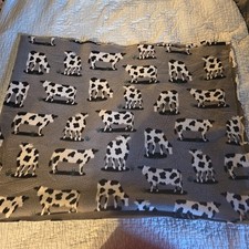 Gray Fleece with Black And White Grazing Cow Print. 24x61. N