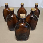 VINTAGE BICENTENNIAL  LOG CABIN SYRUP BOTTLES LOT OF 6 AMBER GLASS WITH CAPS — photo 1