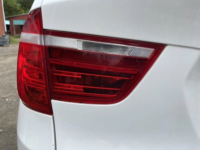 2011-2017 BMW X3 Tail Gate Alpine White Emblem Scratch - Image 4 of 4