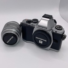 Olympus OM-D E-M5 16.1MP Silver Digital Camera with 14-42 lens Excellent