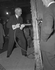 John D Rockefeller Jr Philanthropist of worldwide renown handles a - Old Photo