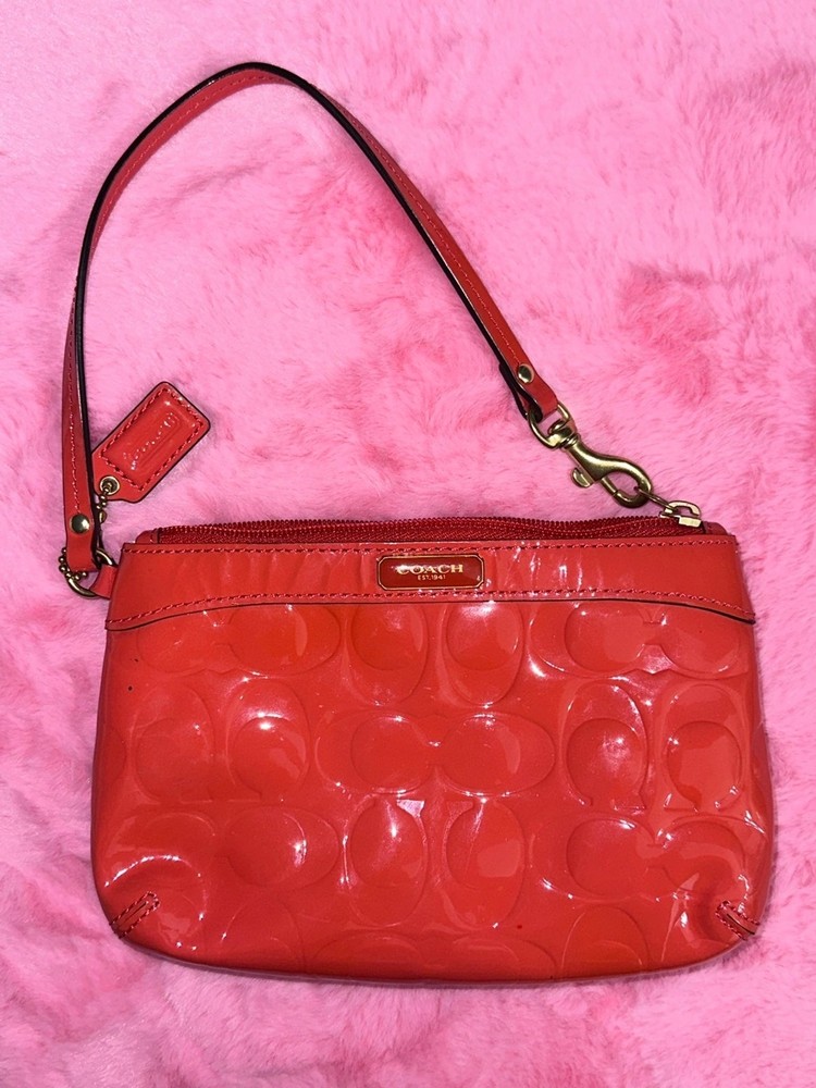 Coach Orange Patent Leather Embossed Logo Wristlet EUC
