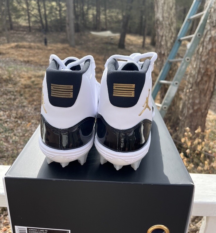 gold jordan 11 cleats