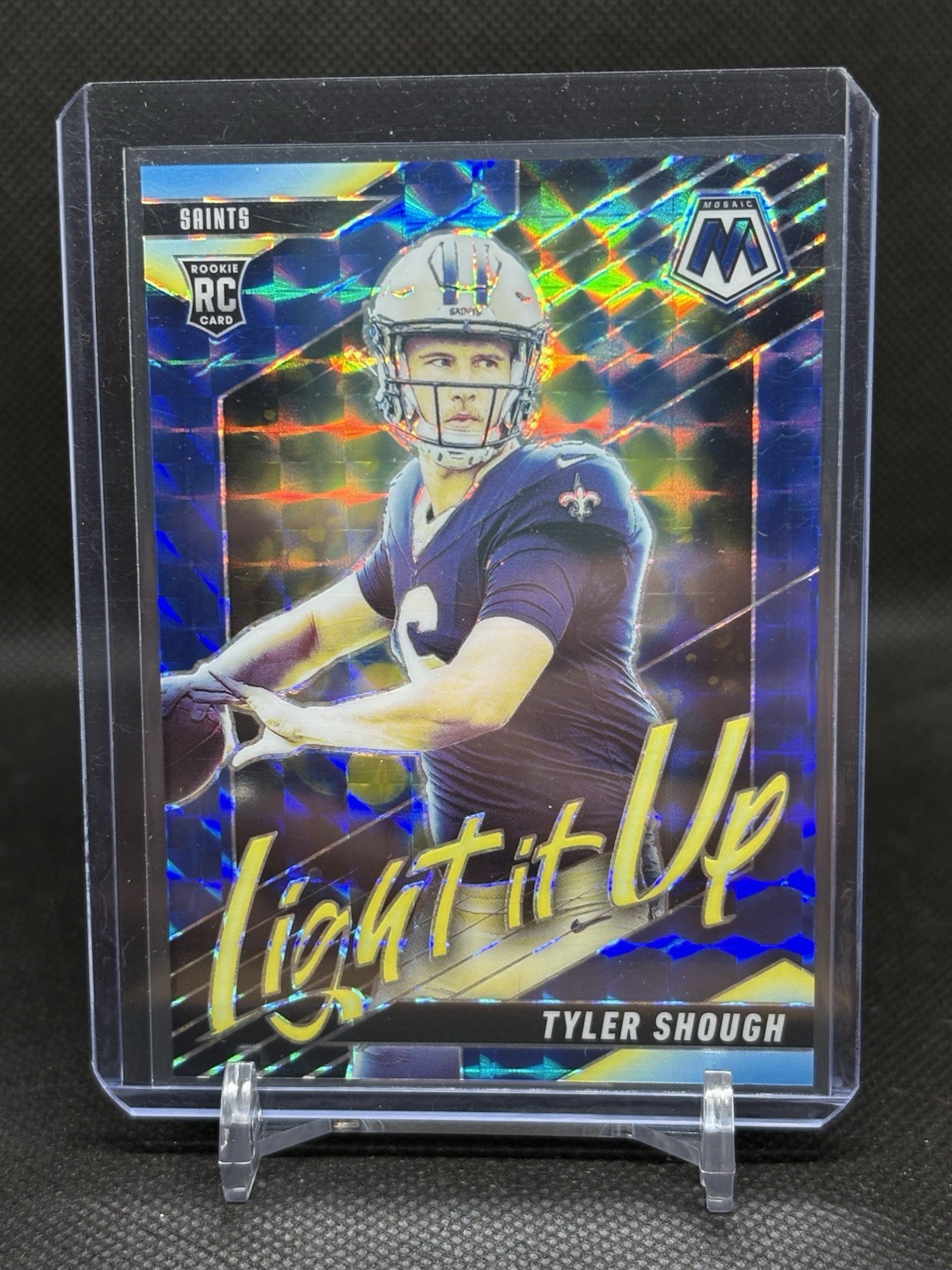 2025 Mosaic Tyler Shough Light It Up Blue Prizm #/99 Saints Rookie