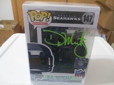Autographed D.K. Metcalf Seattle Seahawks 147 NIB Funko Pop  COA