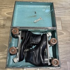 Vintage 1960s Chicago Betty Lytle roller skates with original carrying case.