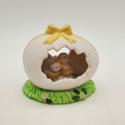 Small ceramic egg with chicks on the inside decoration painted