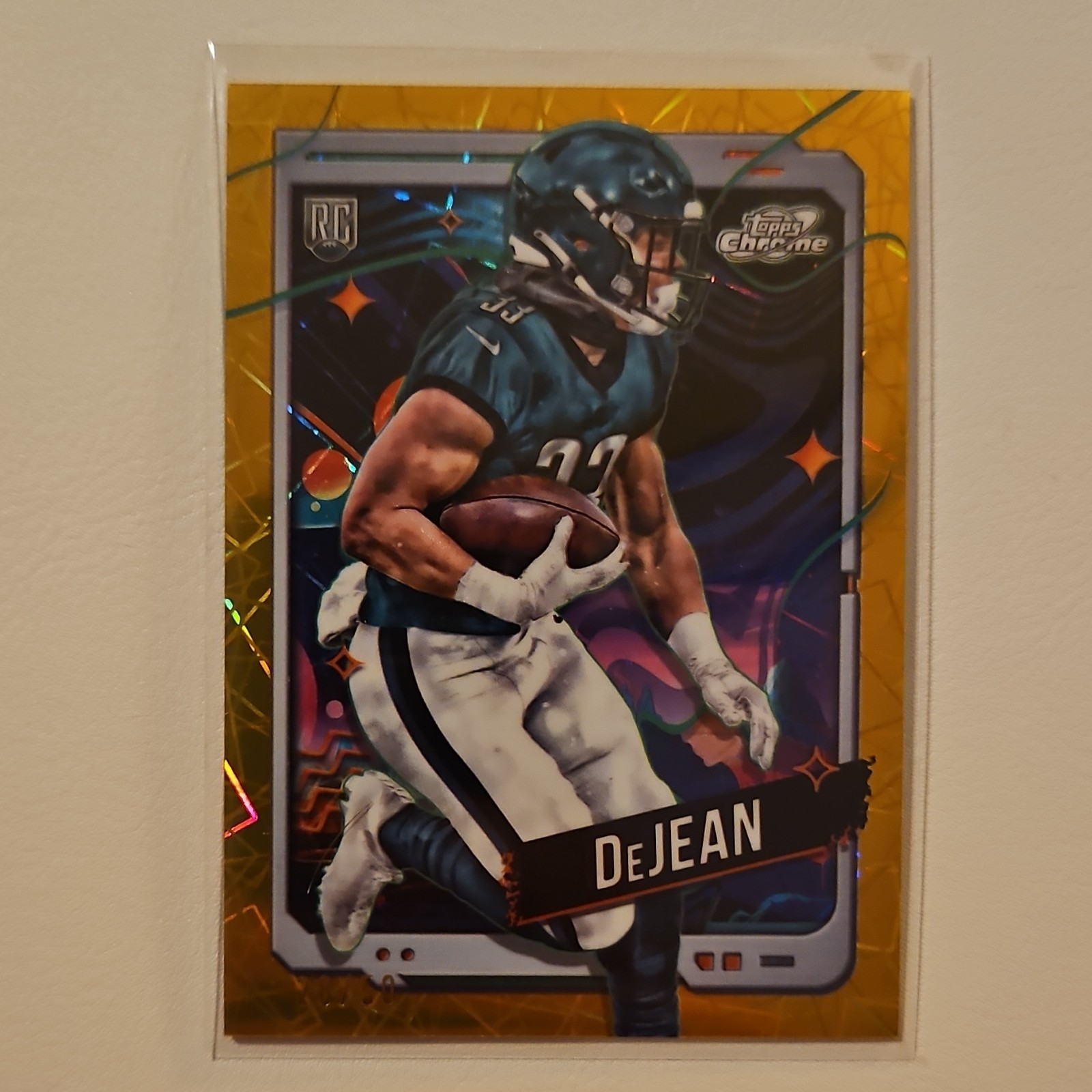 Topps 2024 Cosmic Chrome Gold Interstellar RC Cooper DeJean Eagles #177 /50