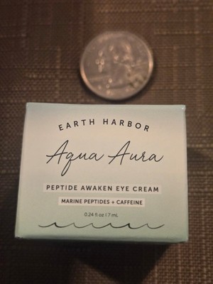 Earth Harbor Aqua Aura Peptide Awaken Eye Cream in a 0.24 fl oz size.