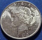 A 1923 PHILADELPHIA MINT PEACE DOLLAR CHOICE BU. WHITE!!!