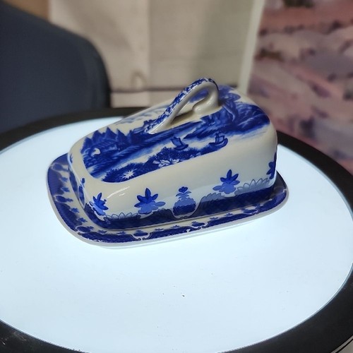 Blue willow delft design on this mini cheese covered dish