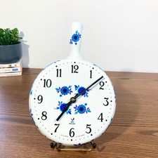Horloge murale JAZ vintage – céramique – Décor floral années 70