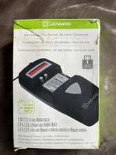 RARE FINE All-in-one battery charger for Mobile Phones, Cameras, and Camcorders