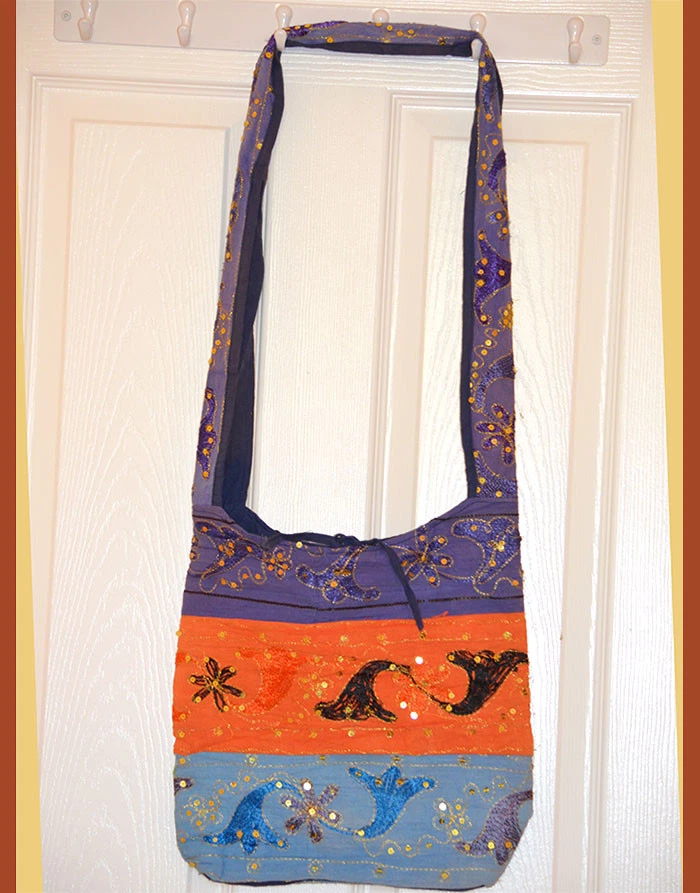 Embroidered sling clearance bag