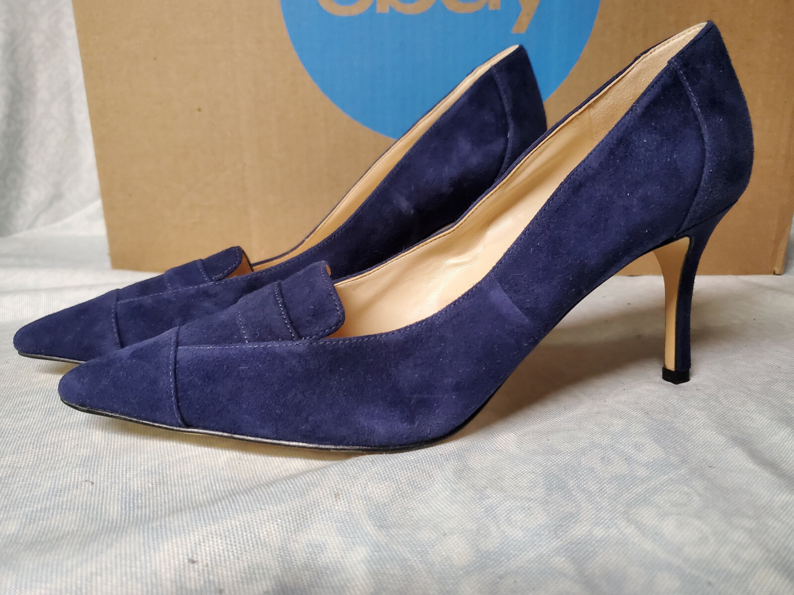 quavissa pointy toe bow pumps