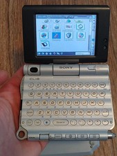 Sony CLIE Handheld PEG-UX50/U + PEGA-JC40 Charger Cradle + PEGA-AC10 charger