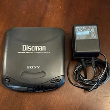 VINTAGE SONY DISCMAN CD COMPACT PLAYER D-141  W/ POWER CORD - FOR PARTS TURNS ON