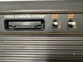 Atari 2600 4 Switch Woodgrain with 4 Controllers Untested No Power Cord