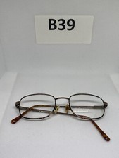 eyeglasses looking glasses 7562 52-20 145 br/demi amber