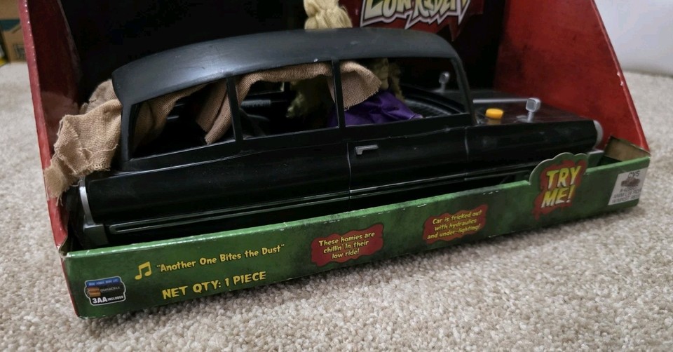 Gemmy Animated Lowrider Hearse w/ Undead Driver, Another One Bites the ...